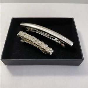 Two hair clips different sizes. Faux diamonds and silver